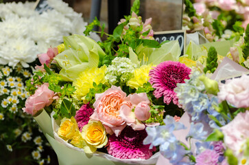 colorful bouquets of pink flowers on the showcase close
