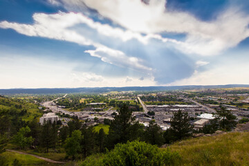 Fototapeta na wymiar Clouds over Rapid City, South Dakota seen from Skyline Drive