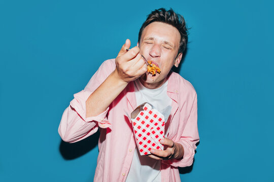 Man Eating Pasta 