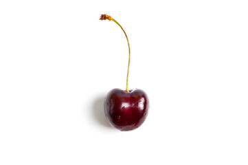 Red sweet cherry isolated on white background.