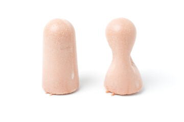 Sand color ear plugs isolated on white background.