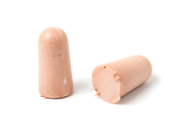 Sand color ear plugs isolated on white background.