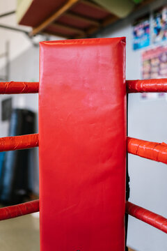 Red corner pad on boxing ring