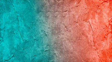 Dark orange blue green teal abstract background. Gradient. Toned rough stone surface with cracks. Close-up.