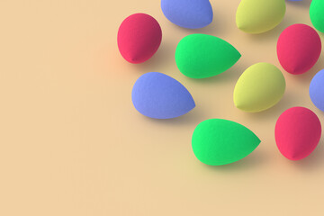 Egg sponges on beige background. Cosmetic accessories. Beauty and fashion. Makeup tools. Copy space. 3d render