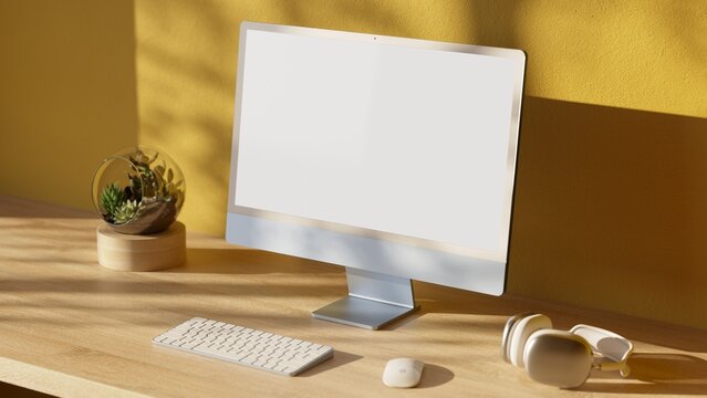 Computer with blank screen on wood table. Aesthetic workplace.  