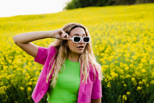 Fashionable Woman Standing In Nature
