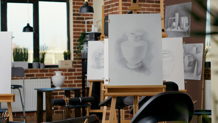 Empty art class with artistic equipment and canvas with easel to learn new skills for personal development. Nobody in classroom used for contemporary drawing practice, creative hobby.