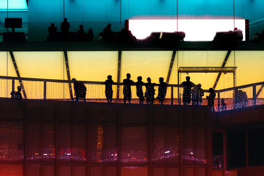 Business people silhouettes at night in the city