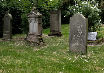 Tombstones in the old pre-war cemetery. Sehnde, Germany.