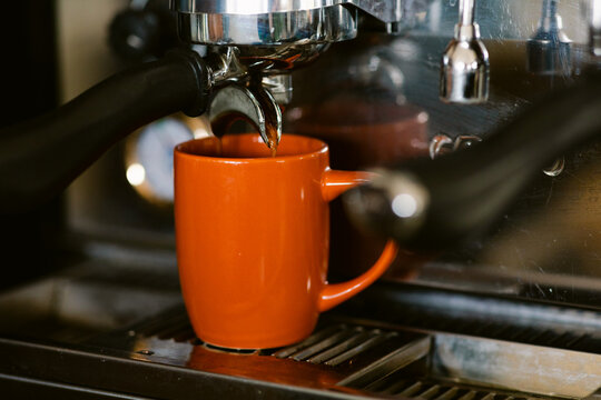 Still coffee mug on espresso machine