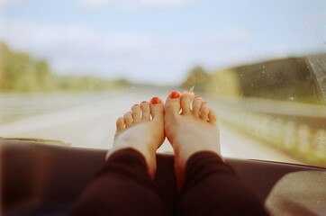 A foot selfie from the car