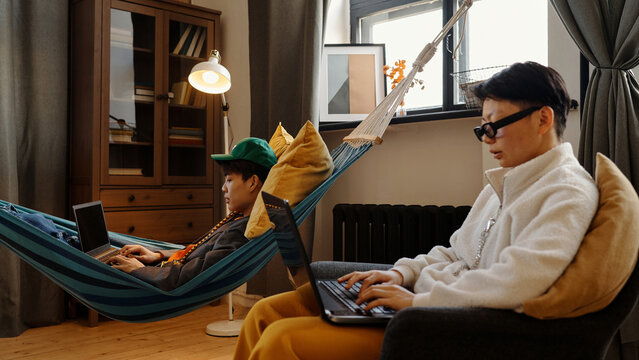 Working On Laptops In Office