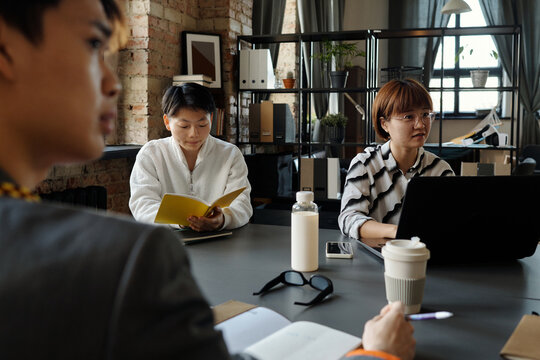 Young Asian People At Meeting