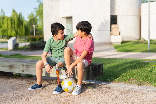 Two kids chatting and playing