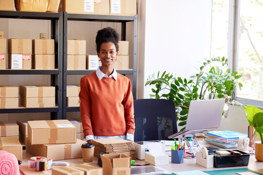 Happy black manager in logistic office