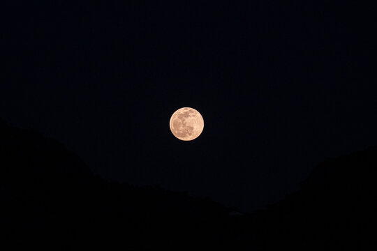 full moon in the middle of the frame - Powered by Adobe