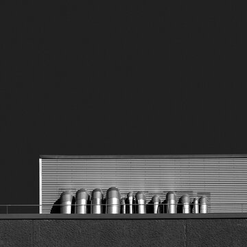 Abstract minimalist industrial building detail with metal pipes 