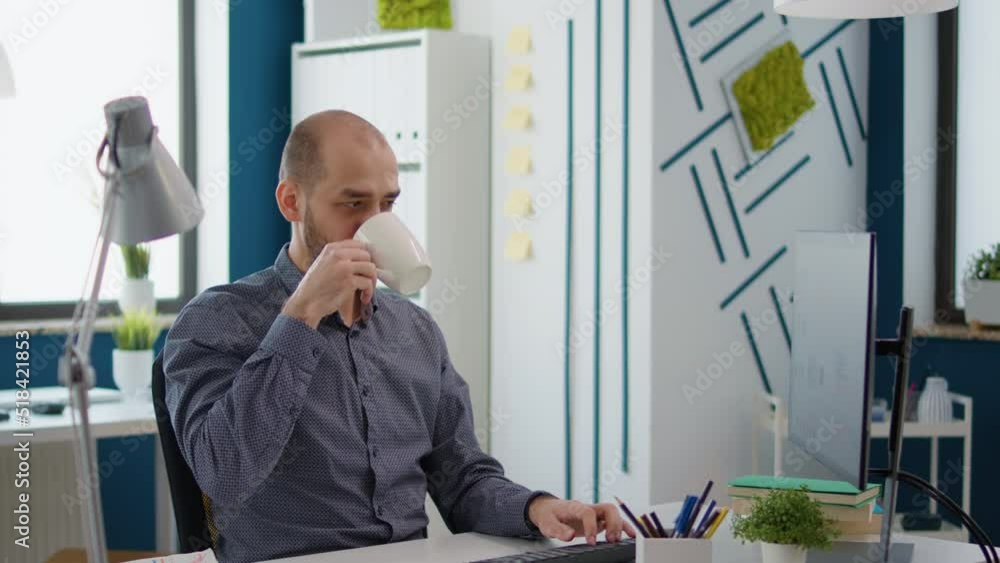 Poster sales consultant planning financial project on computer to do research analysis with business charts