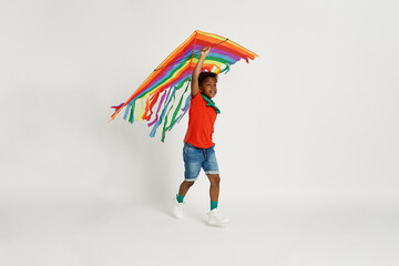 Boy playing with kite