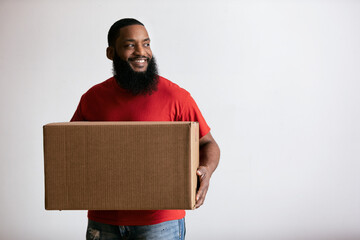 Cheerful Man Carrying Package For Shipment