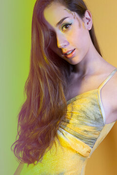 Beautiful fashionable girl haired with long curly hair