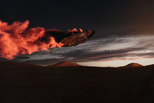 UFO with smoke over desert
