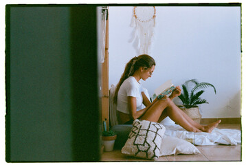 natural woman posing at home with expired film