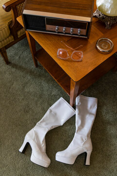Wood Paneling  vintage Retro home with radio and high heel boots