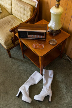 Wood Paneling in vintage Retro home with radio and high heel shoes