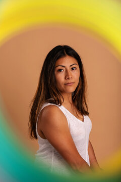 Beautiful woman in studio color portrait