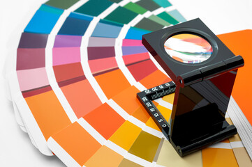 Printing loupe used to examine colour chart concept for color check, analyze quality of output...