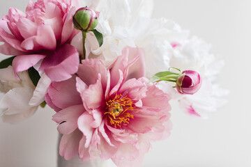 vase filled with peonies