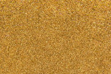 Golden yellow metal shavings waste steel recycling iron texture background