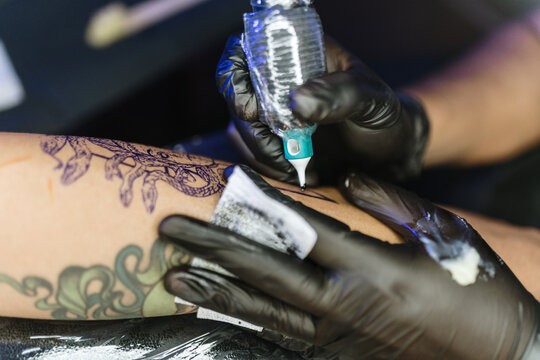 Close-up of tattoo being made