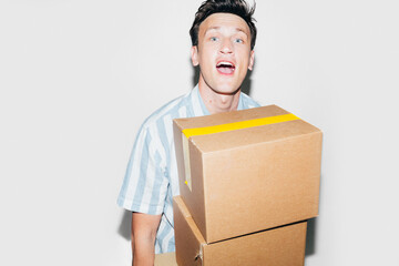 Man Holding Boxes 