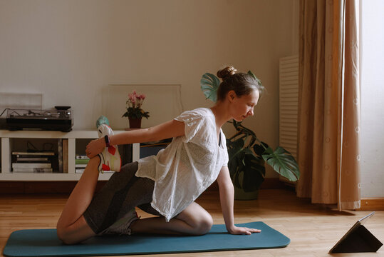 Woman doing exercises at home