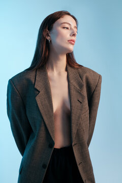 Fashion portrait of model in unbuttoned jacket