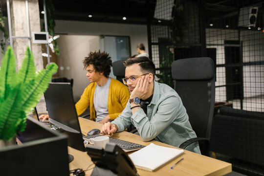 Male Colleagues Working