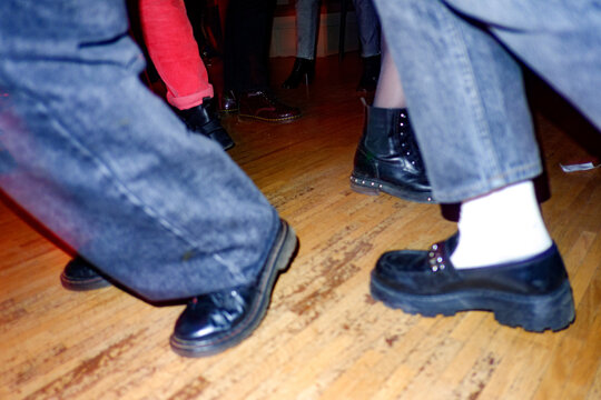 Abstract Dancing Feet Of People At Party