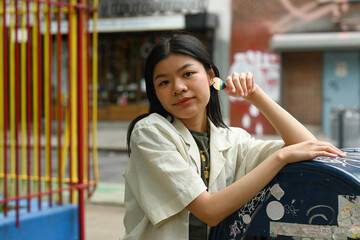 Young person with rainbow heart