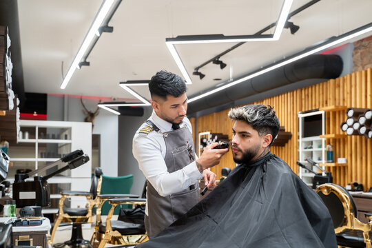 Barber Shaving The Client