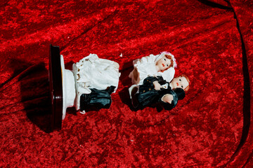 wedding cake topper torn in two