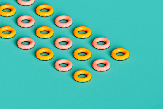rows of yellow and pink inflatable rings