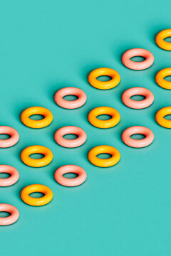 rows of yellow and pink inflatable rings