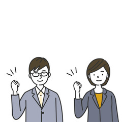 ガッツポーズをするスーツを着た男性と女性