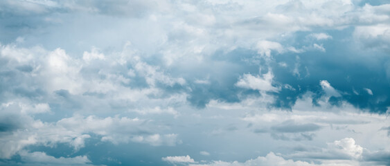 Blue gray clouds background, dramatic sky, beautiful cloudscape, wide banner size