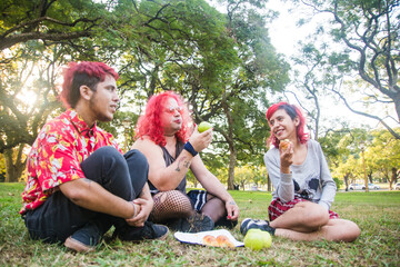 Queer friends picnic in the park