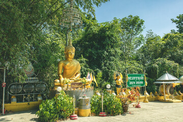 Atmosphere inside religious tourist attractions at Maha Chedi Tripob Trimongkol with large stainless steel pagoda. Photo from Phra Maha That Chedi Triphop Tri Mongkhon, Hat Yai, Thailand 