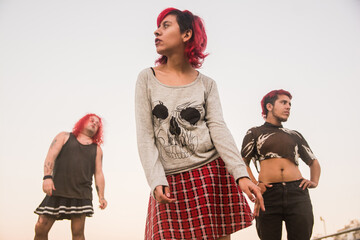 Non-binary person and their friends